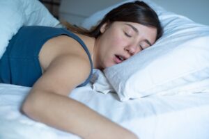 Woman sleeping with her mouth open